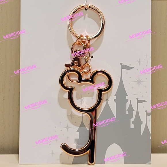 DISNEY PARKS MICKEY ROSE GOLD DOOR OPENER KEYCHAIN - Picture 2 of 3